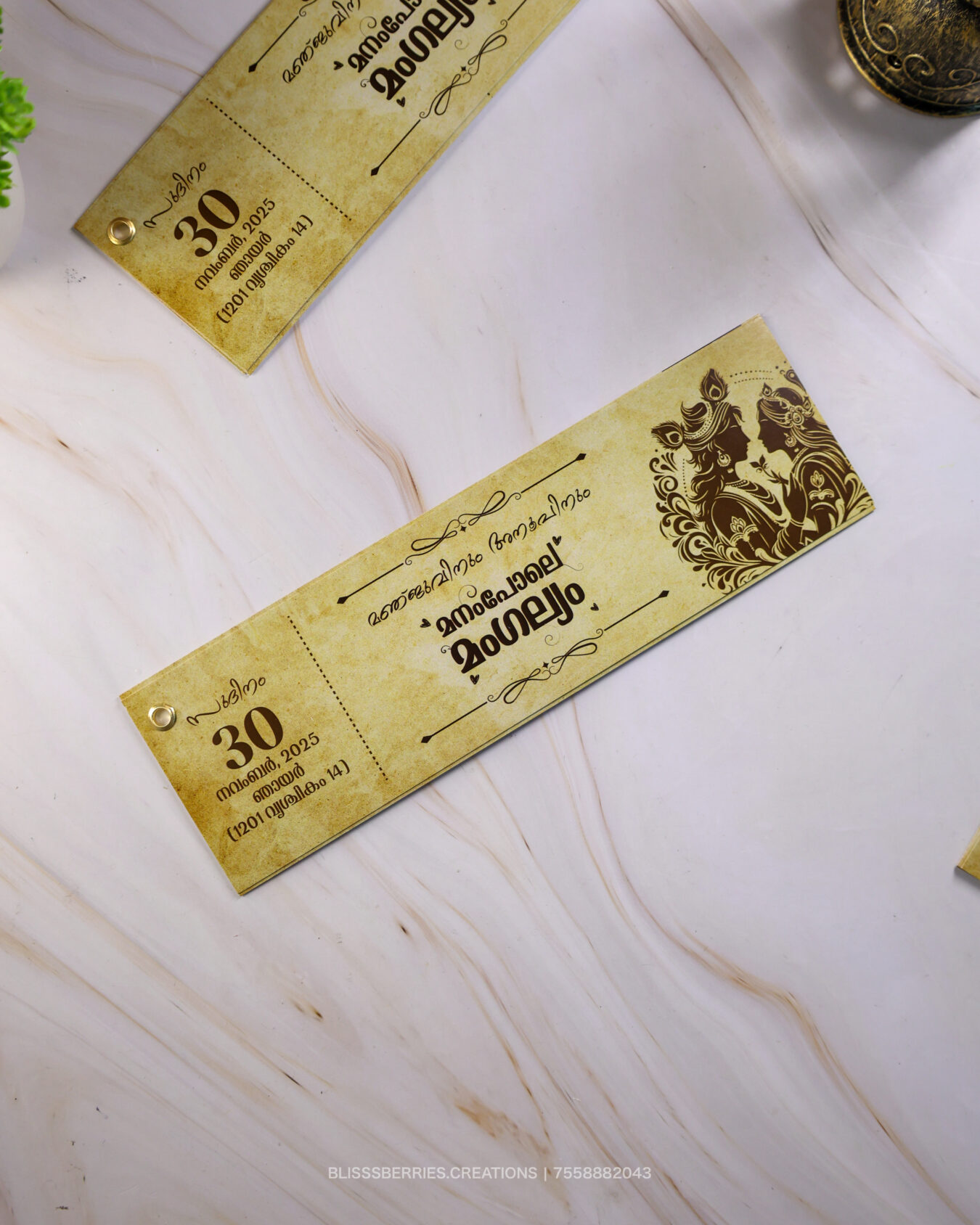 Traditional Kerala Heritage Design – Thaliyola Wedding Invitation Card with Rivet Binding