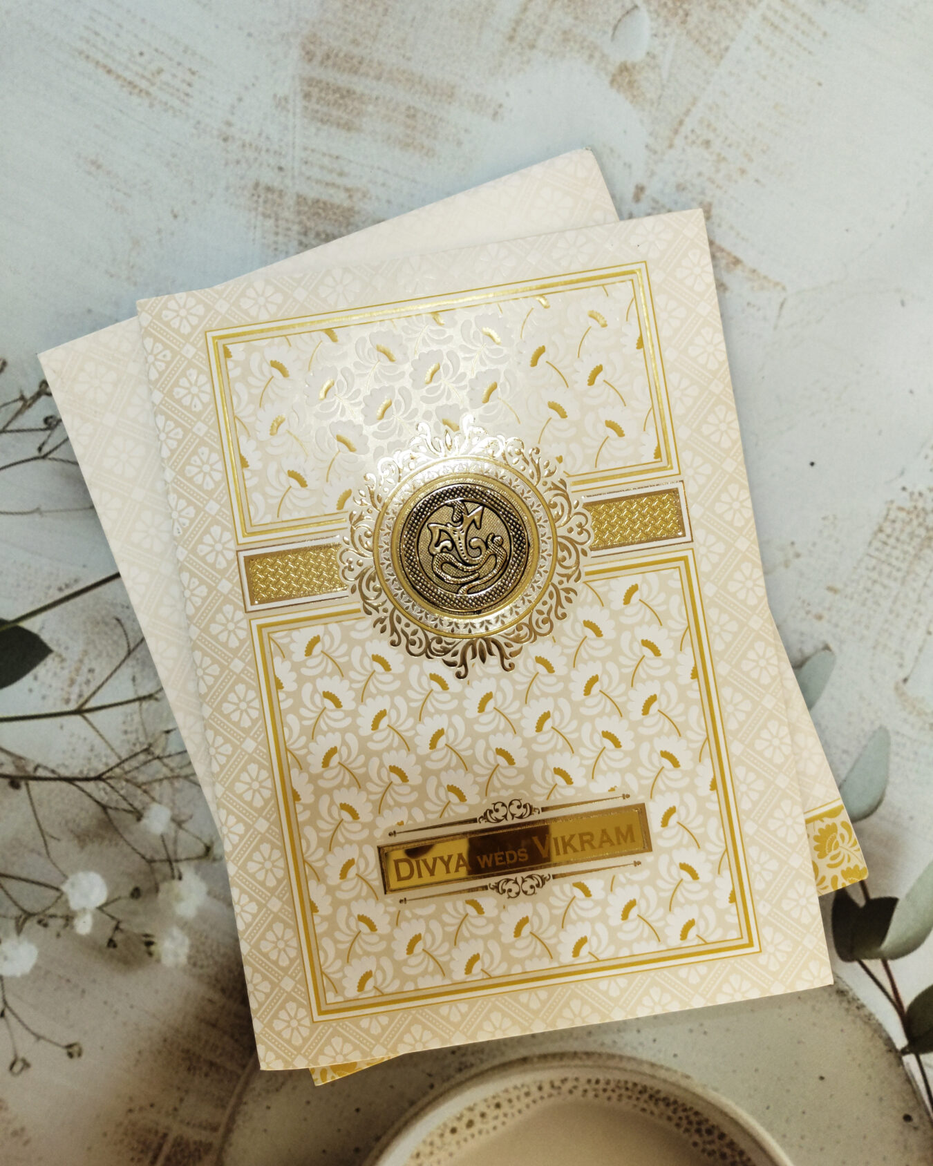 Premium White & Gold Ganesha Wedding Invitation Card with Custom Acrylic Nameplate and Matching Envelope
