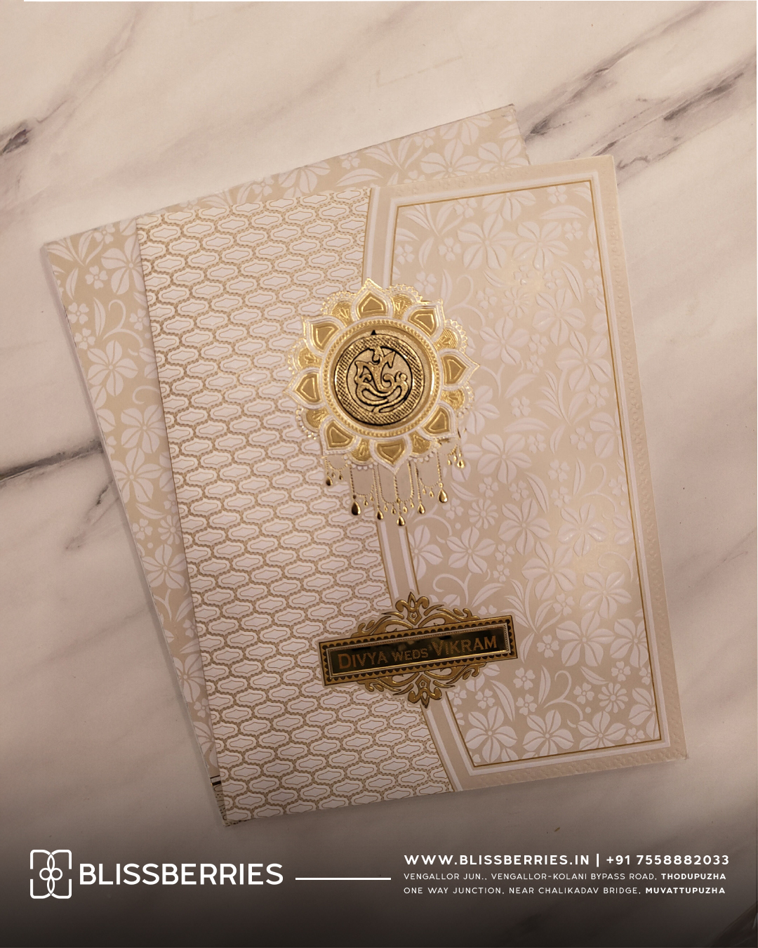Cream & Gold Floral Embossed Wedding Invitation Card with Acrylic Nameplate & Customisable Emblem | Matching Envelope
