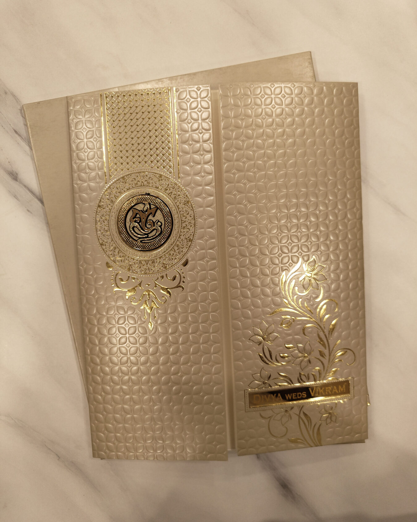 Brown & Gold Embossed Wedding Invitation Card with Acrylic Nameplate, Customisable Emblem & Matching Envelope