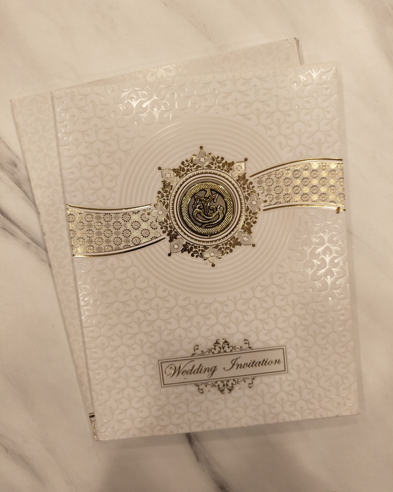 White Embossed Wedding Invitation Card with Acrylic Nameplate, Customisable Emblem & Matching Envelope